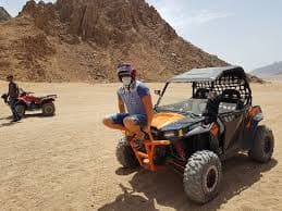 A beautiful desert safari experience By buggy with two seats